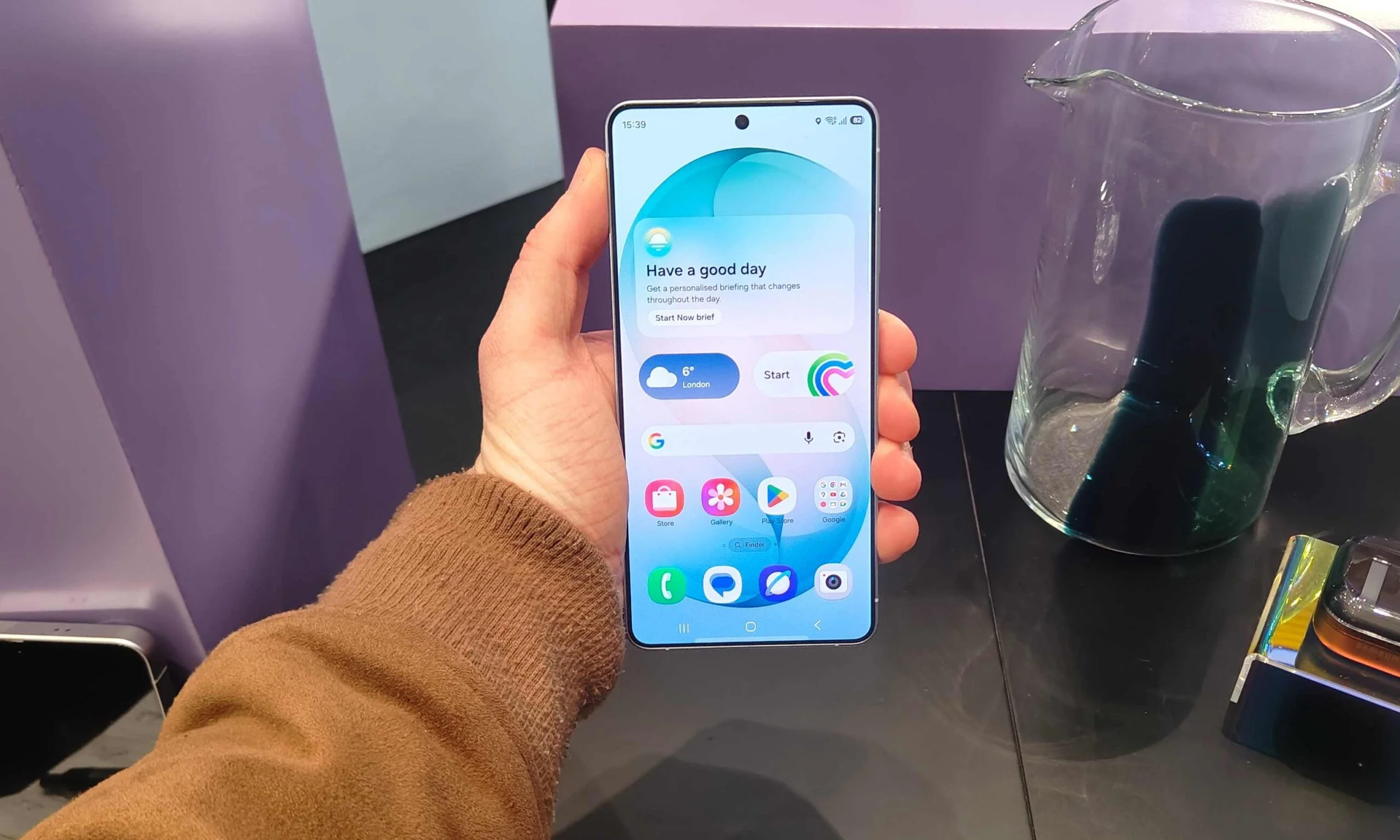 A Samsung Galaxy S26 Ultra in a man's hand.