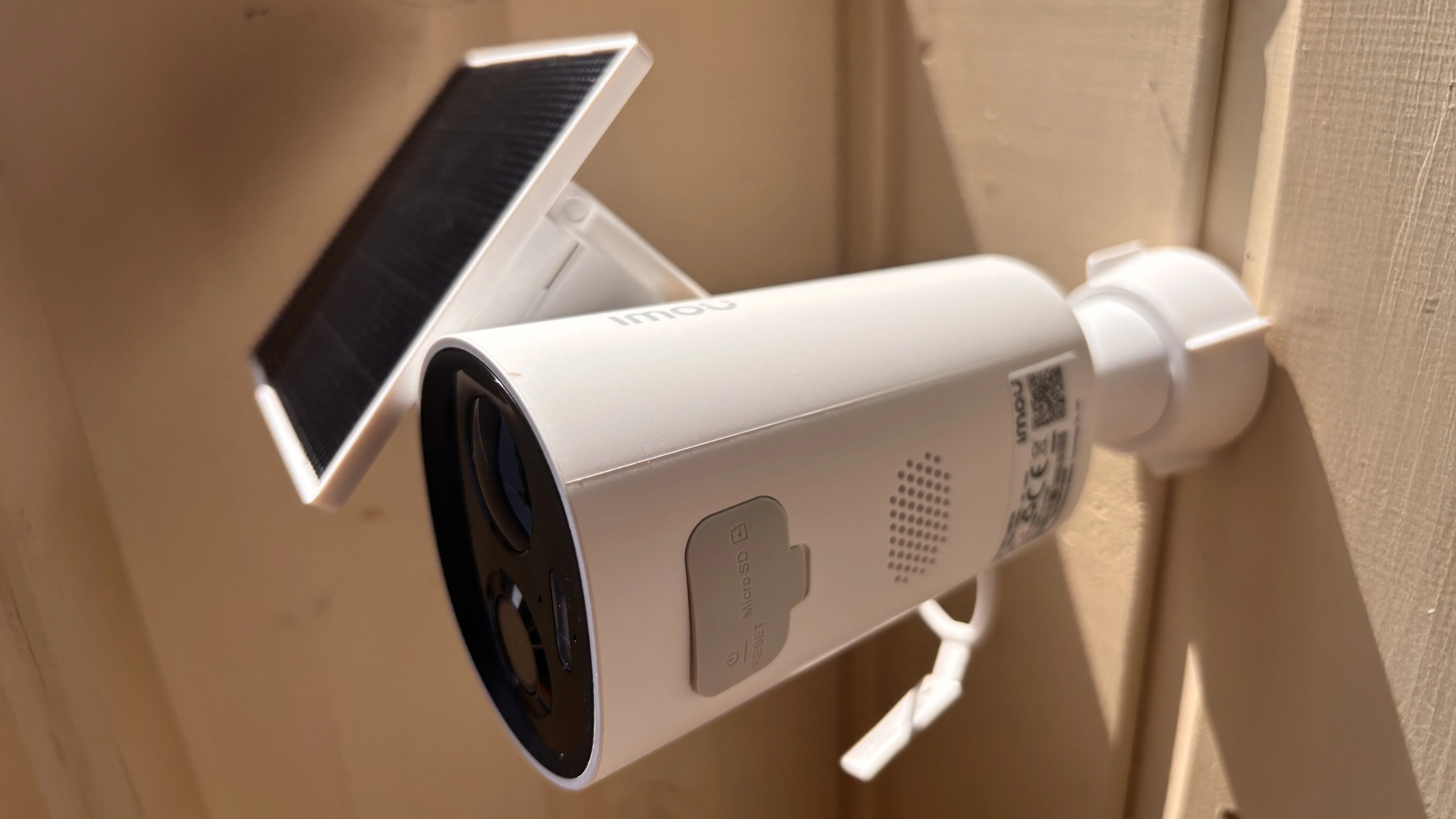 IMOU Cell 3C All-in-One Security Camera mounted outdoors side view