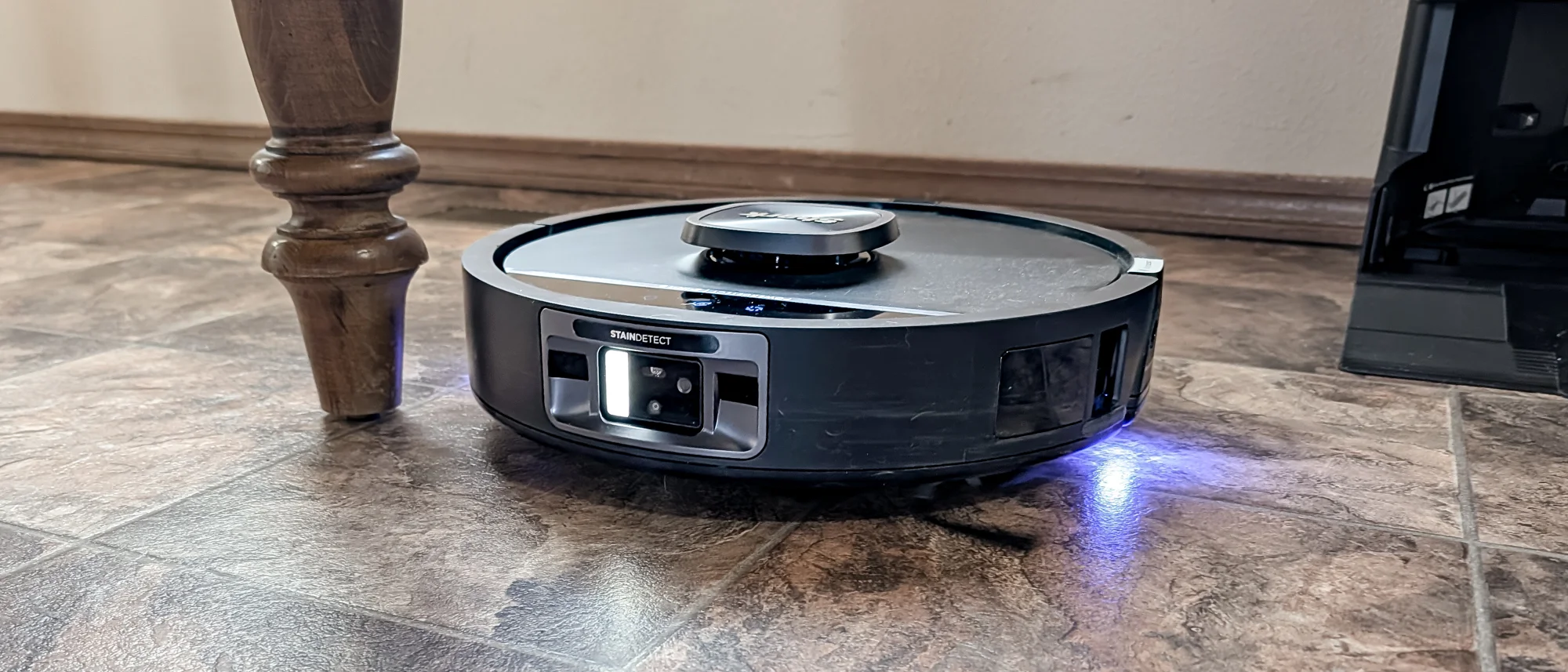 Shark UV Reveal PowerDetect Robot Vacuum on a kitchen floor