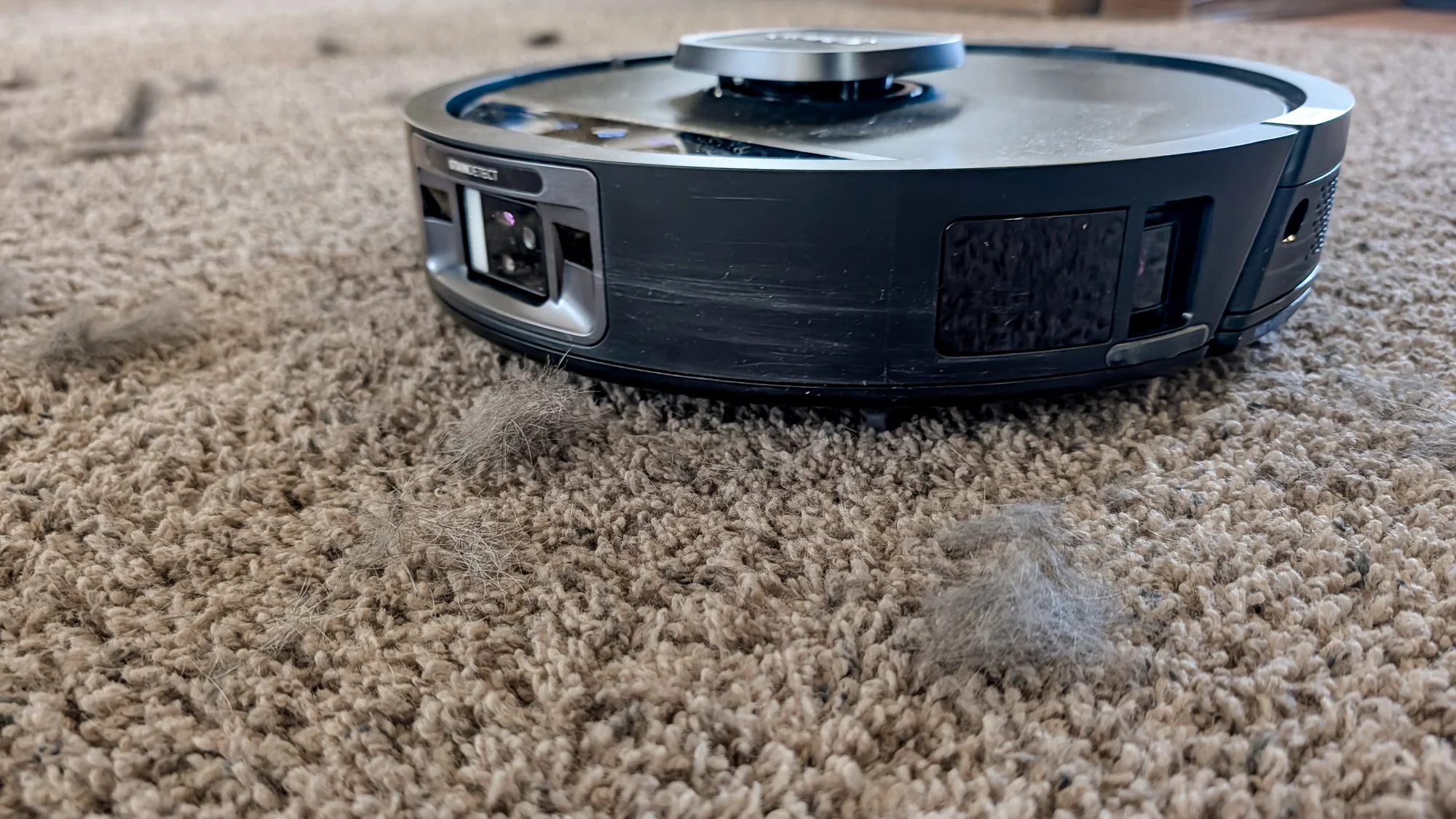 Shark UV Reveal PowerDetect Robot Vacuum on a carpet