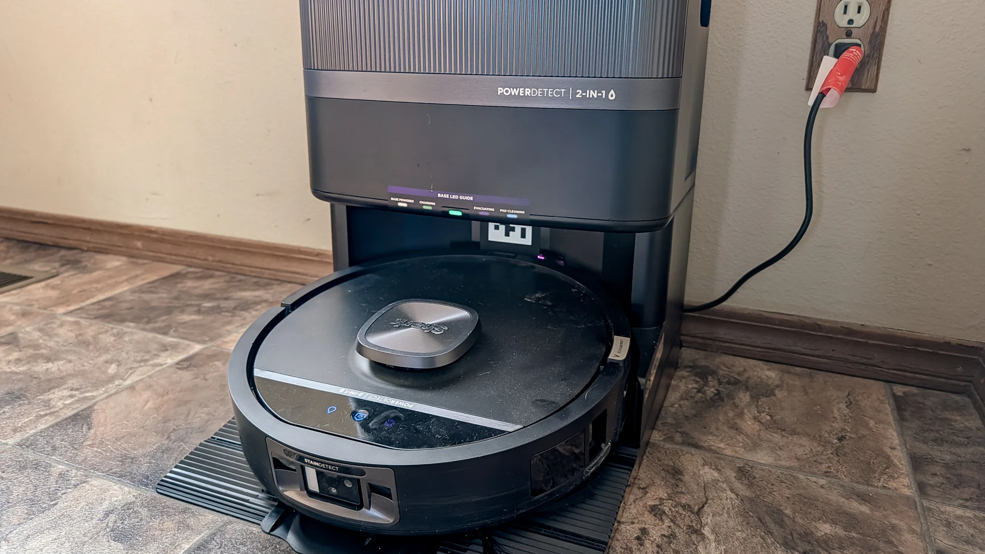 Shark UV Reveal PowerDetect Robot Vacuum and dock on a kitchen floor