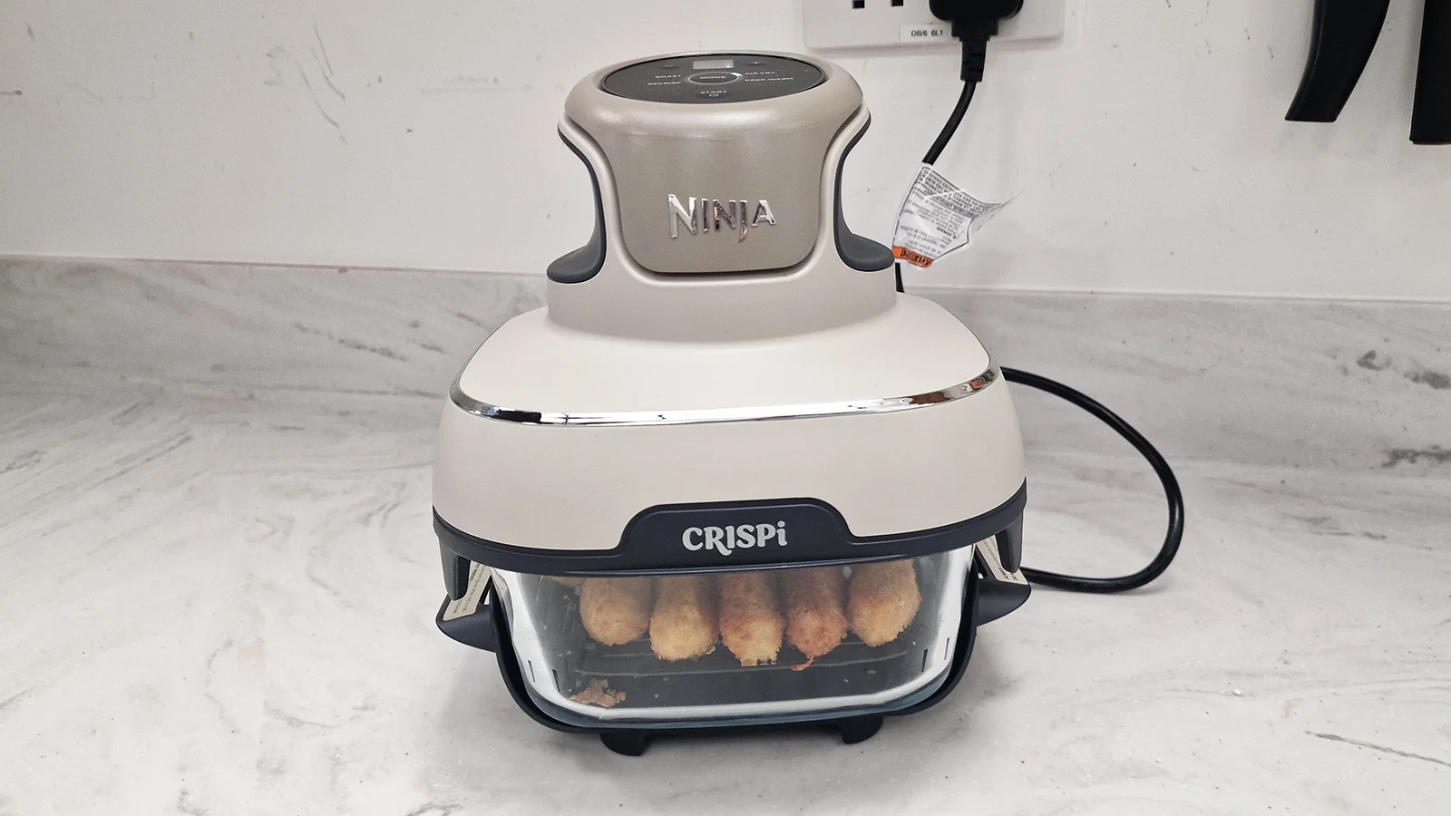 Ninja Crispi air fryer being tested in the Tom's Guide test kitchen