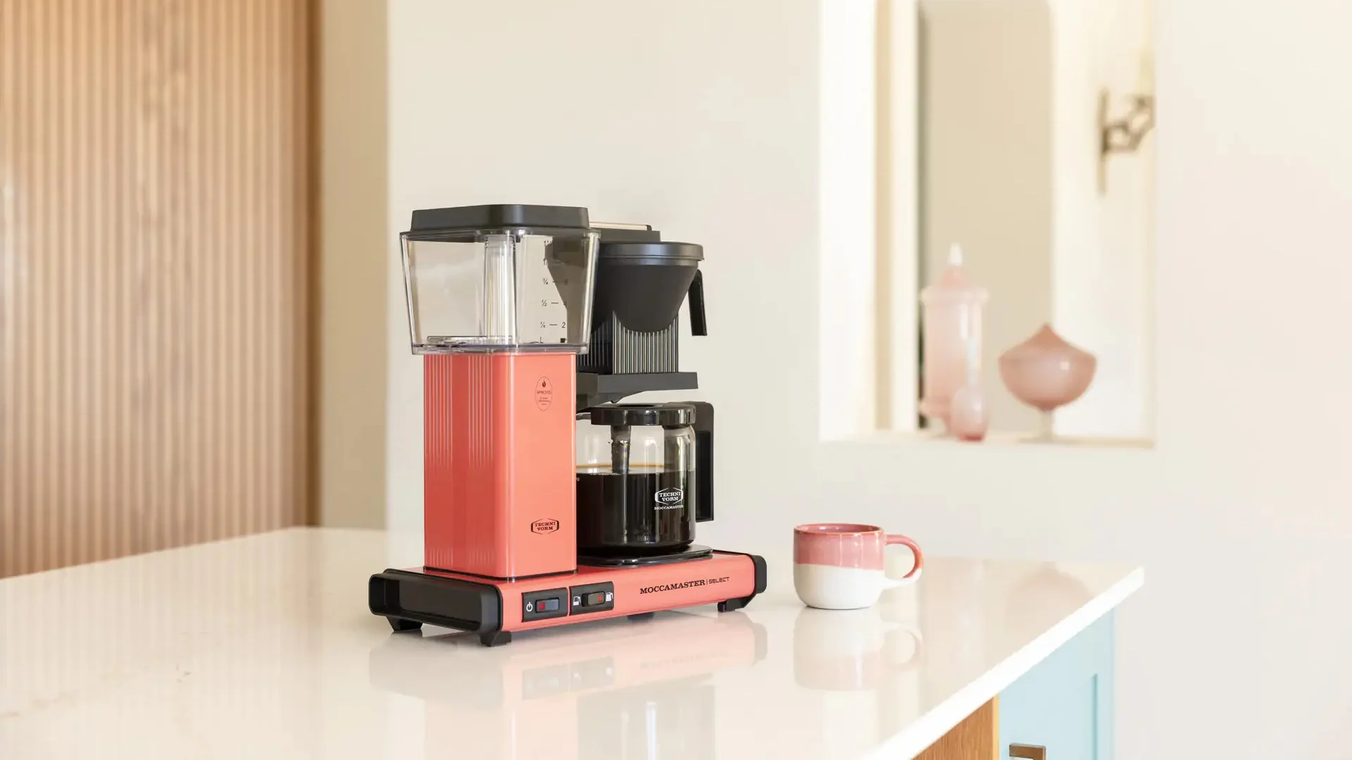The Moccamaster in Sorbet on a kitchen counter