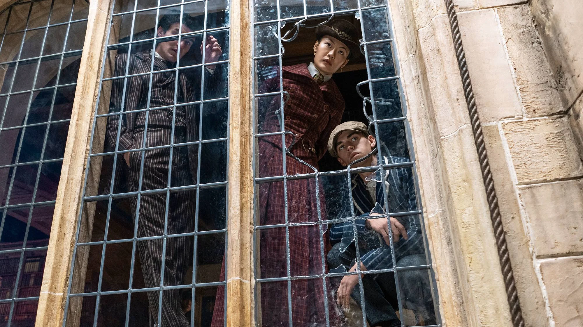 Do&amp;#769;nal Finn, Zine Tseng, and Hero Fiennes Tiffin in "Young Sherlock" on Prime Video